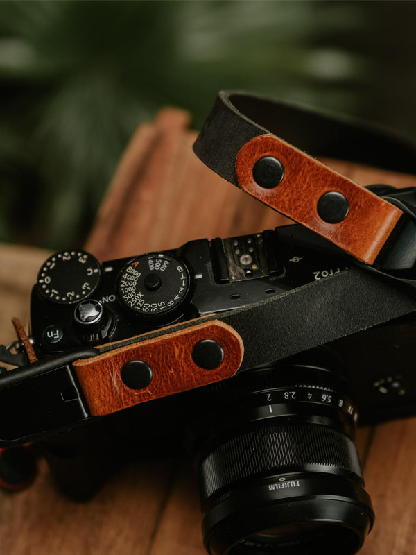 Lavietnamita leather camera strap two tone leather black and whiskey colours attach on camera 