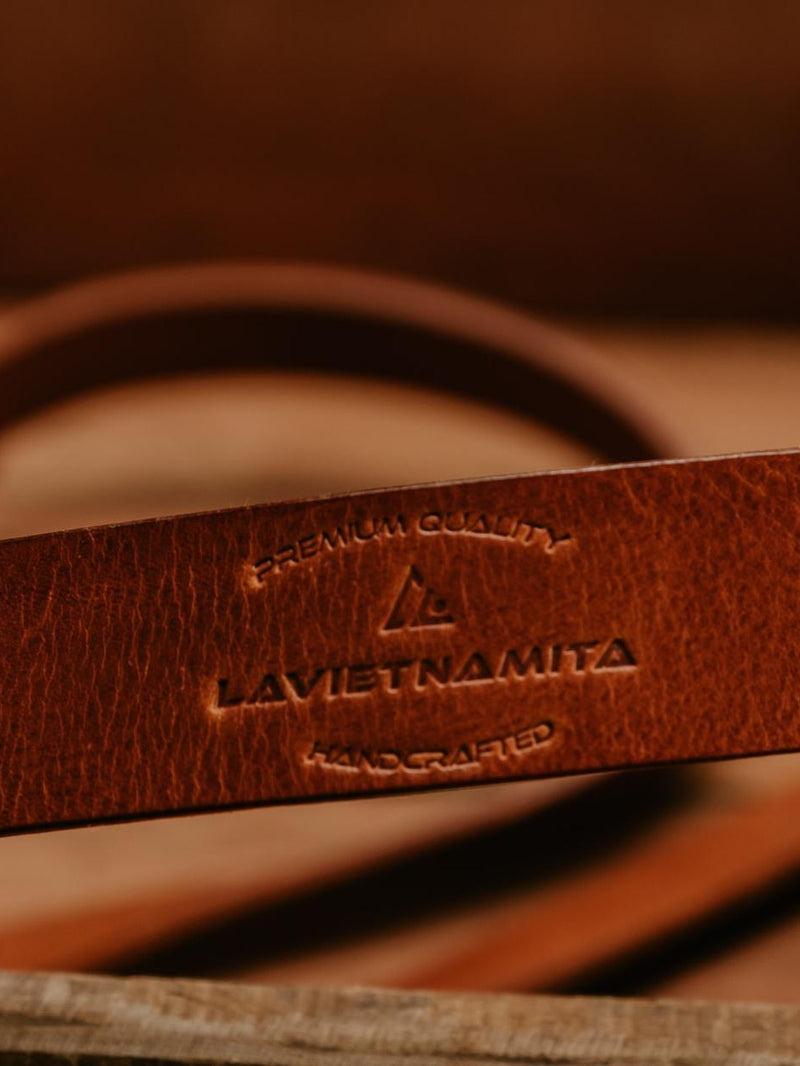 Lavietnamita leather camera strap with neck pad close up store logo