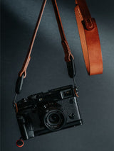 Lavietnamita full grain leather camera strap neck pad comfort hang on camera with black backround