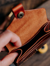 The Traveller leather wallet handmade in Belgium in red colour fully open pockets